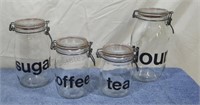 Clear glass canister set.