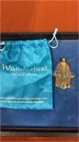 Wanderlust pendant and bag