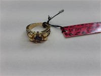 LOVELY GOLD TONE WITH PURPLE RHINESTONE RING -