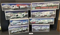 8 Hess Toy Trucks.