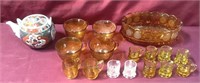 Assortment Of Amber Glass Pieces And A Chinese