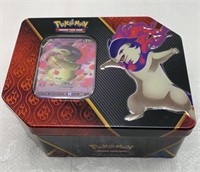 Pokemon tin with cards