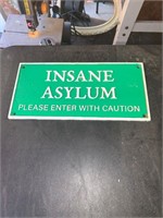 CAST IRON INSANE ASYLUM SIGN