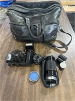 Minolta x-9 camera with accessories and leatherbag