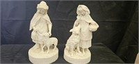 2 porcelain statues