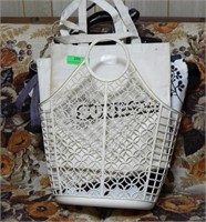 10 tote bags in plastic basket