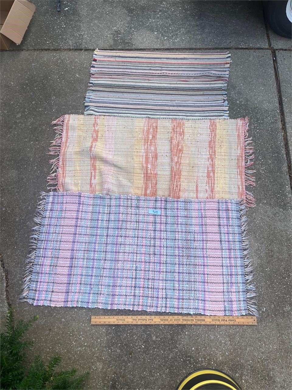 Three rag rugs