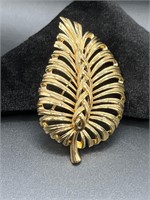 Monet Vintage gold tone leaf brooch pin.