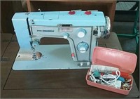 Sewing table with sewing machine and accessories