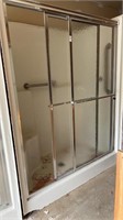 Shower with double sliding doors