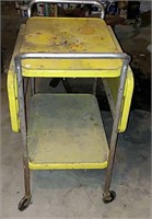 Vintage metal yellow utility cart, drop leaf