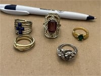 5 costume Jewelry rings - green purple blue stones