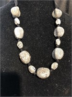 Ceramic stone necklace on ribbon