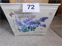 Large metal magazine rack with lilacs on it and