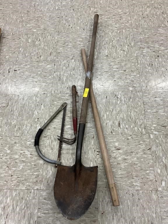 Spade shovel, buck saw, garden rack