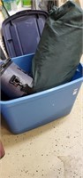 Tote of camping items tent cooler mountain pie