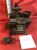 small Cast iron Queen Stove w/pans & coal bucket