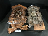 Pair of Nicely Carved German Cuckoo Clocks.