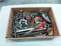 assortment of hand tools and hardware
