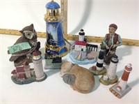 Figurines incl. cat, owl, and lighthouses