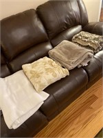 Coordinating lap blankets and white cotton blanket