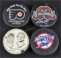 4 Souvenir Collectible Hockey Genuine Pucks Lot