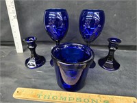 Cobalt blue candle hokders glasses and jar