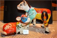 Painted Cow and Calf with many types of Beer on th