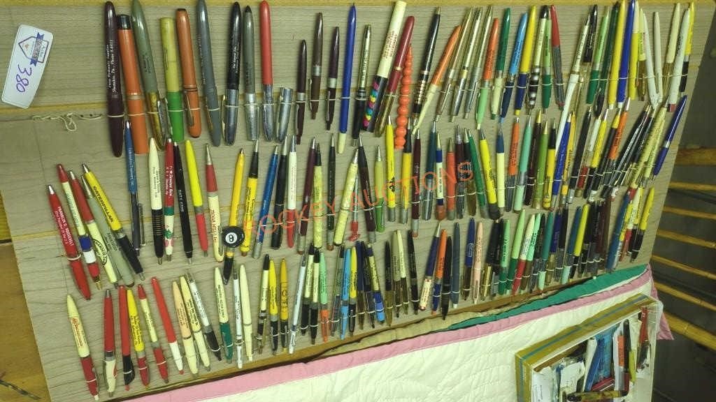 Vintage pen collection on display board