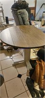 Circular table and 2 chairs 
40" wide