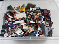 Big bin of Legos pieces - Ben measures 18“ x 13“