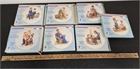 (7) Norman Rockwell Plates In Boxes