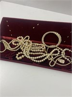 Pearl necklaces in velvet box