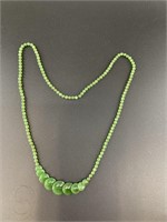 Alaskan Kobuk jade bead necklace. Each bead shows