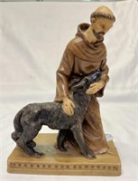 Statue of St. Frances w/wolf -carved or molded,