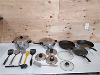 large lot of pots and pans