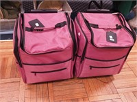 Pair of rolling suitcases