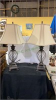 One pair of metal table lamps with swirled glass