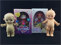 4 Kewpie dolls. 2 are NIB.