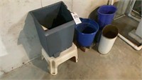 Assortment of trash bins, buckets and a step