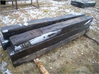 Pile of 8 railroad ties