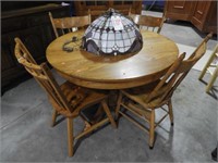 Solid Oak round dining table with (3) antique