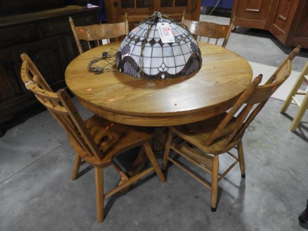 Solid Oak round dining table with (3) antique