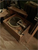Vintage record player in cabinet