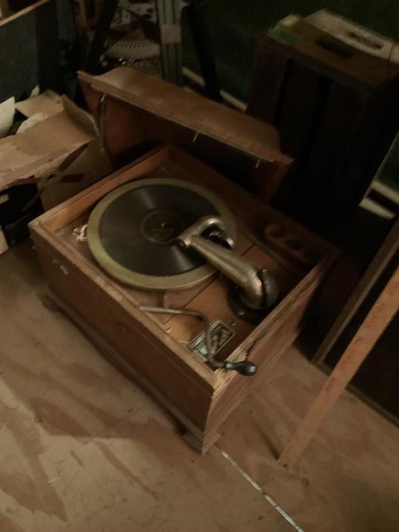 Vintage record player in cabinet