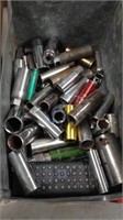 Group of sockets in metal bin