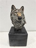 Solid marble base metal wolf statue
