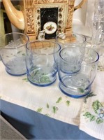 Set of four blue drinking glasses