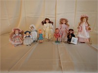Nine assorted porcelain and clay dolls