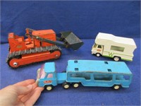 3 older toys (dozer -tonka hauler & rv)